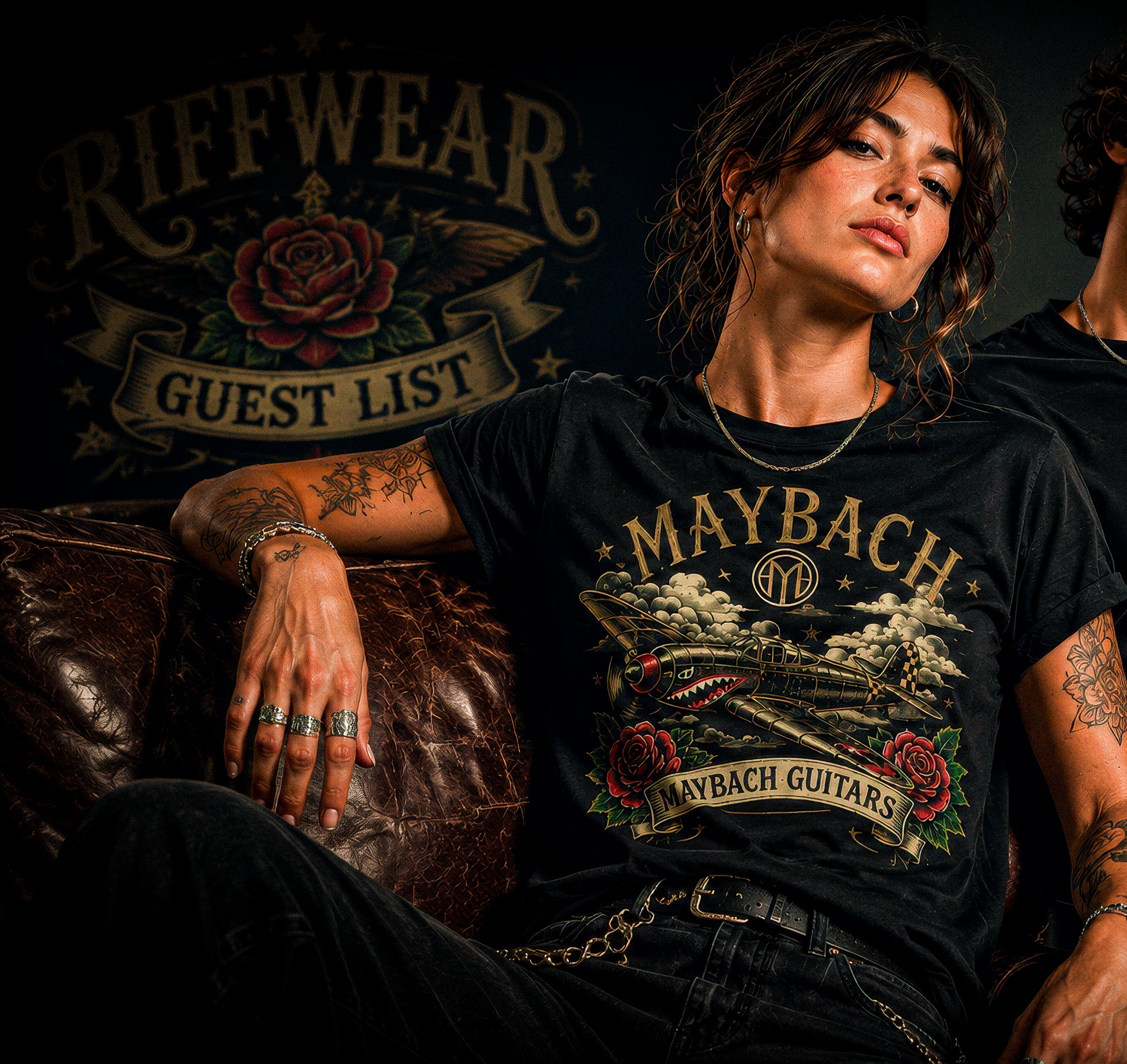Person wearing a Maybach Guitars t-shirt with a dark background featuring the brand logo.